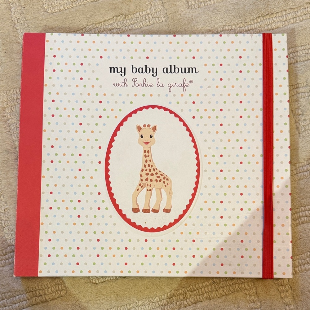 Sophie la Girafe Baby Album with Red Accents